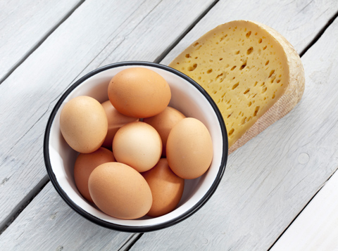 Foods high in vitamin K2 like fermented cheese and eggs may help lower cholesterol.